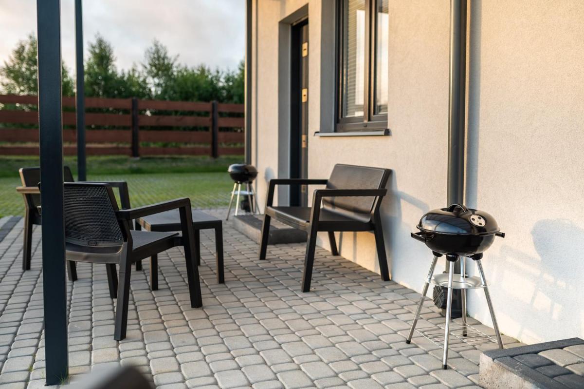 Spokojne Miejsce - domki - apartamenty nad morzem - Housity