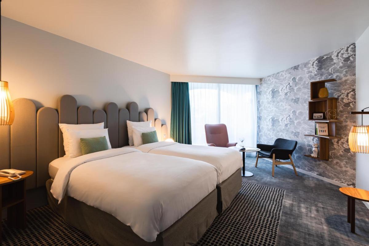 Un ou plusieurs lits dans un hébergement de l'établissement Mercure Aix-les-Bains Domaine de Marlioz Hôtel & Spa