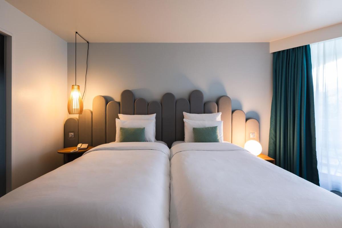 Un ou plusieurs lits dans un hébergement de l'établissement Mercure Aix-les-Bains Domaine de Marlioz Hôtel & Spa