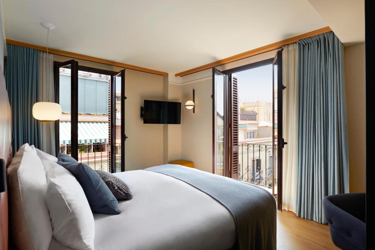 Cama o camas de una habitación en Kimpton Vividora Hotel by IHG