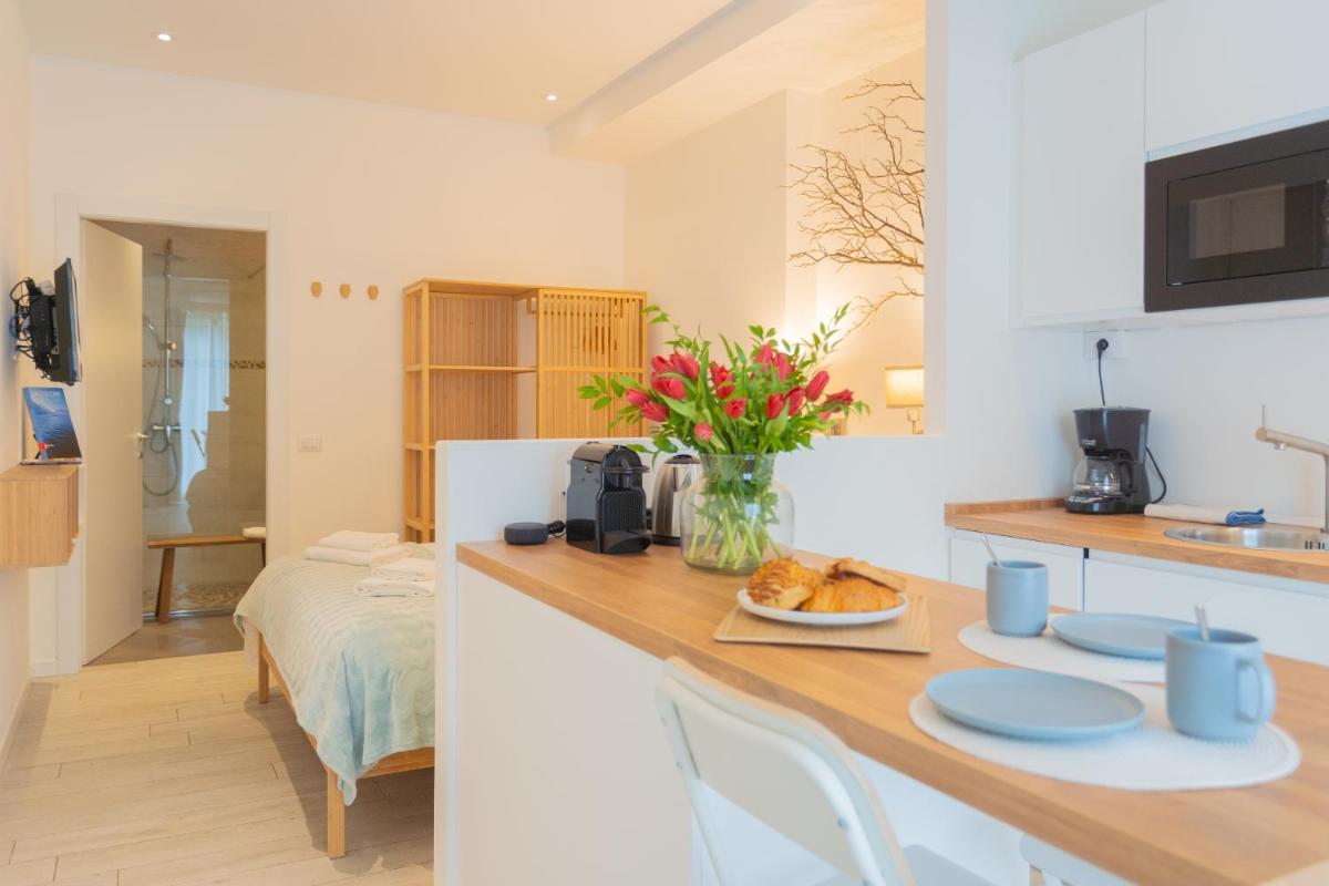 Suitetrails - Enchanted Como Lake - Tremezzo Apartments by Rent All Como