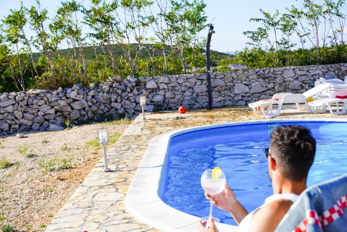 Beautiful secluded area near Novalja vacation house with pool and sea view Villa Lara - Housity