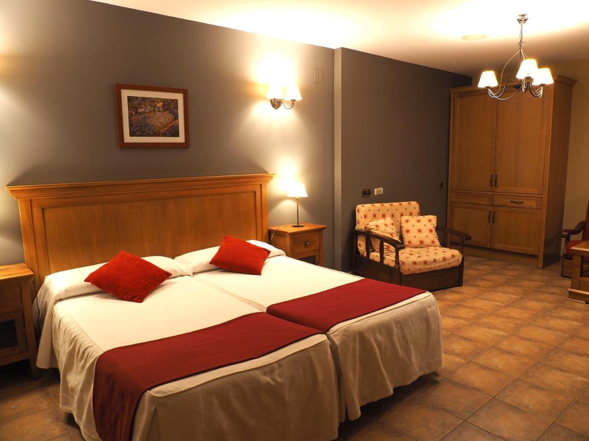Cama o camas de una habitación en Hotel & SPA Peña Montañesa