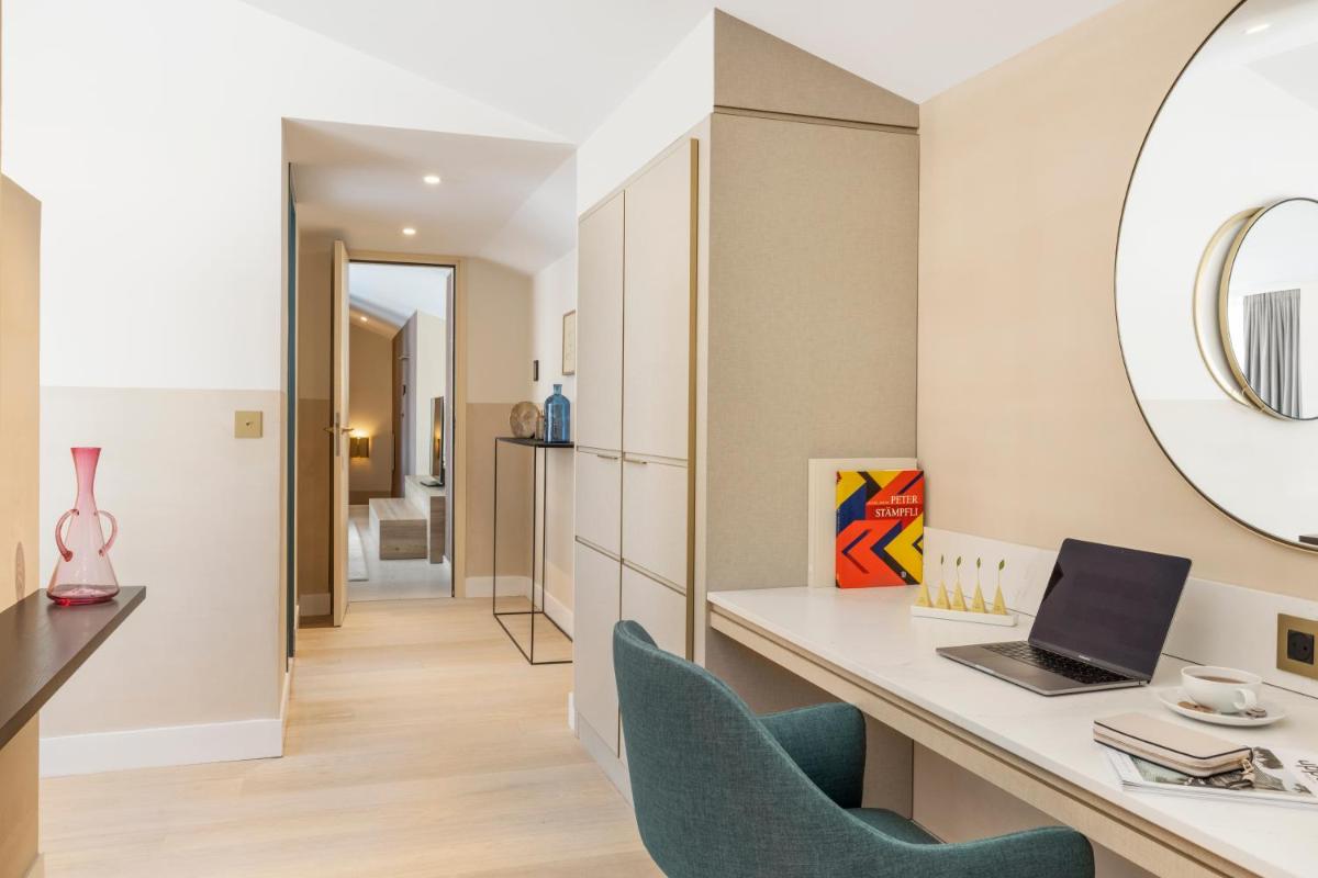 Télévision ou salle de divertissement dans l'établissement Maison Albar Hotels L’Imperator