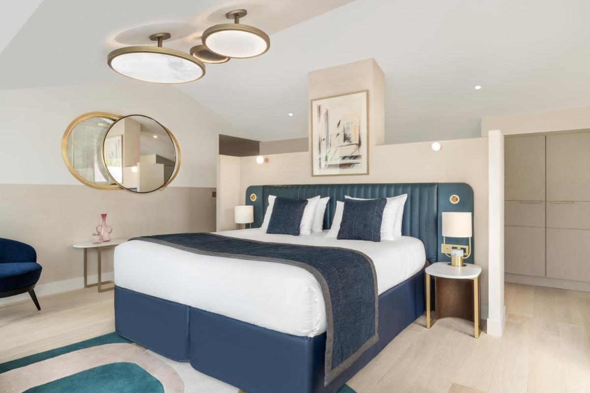 Un ou plusieurs lits dans un hébergement de l'établissement Maison Albar Hotels L’Imperator