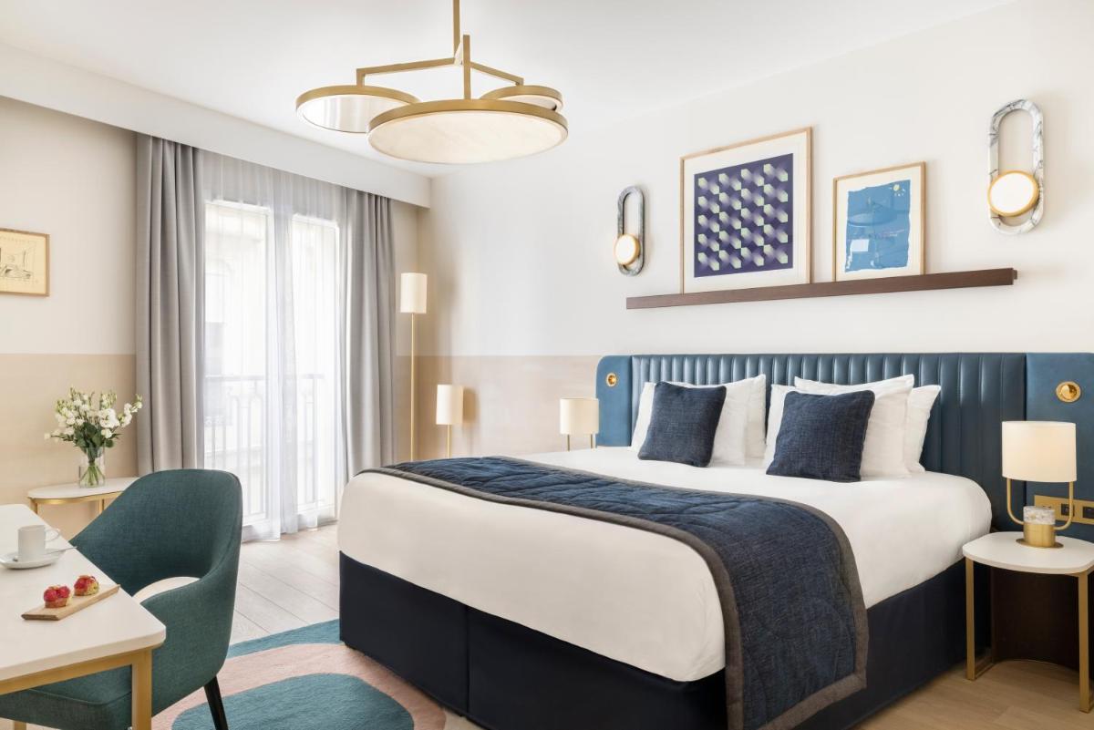 Un ou plusieurs lits dans un hébergement de l'établissement Maison Albar Hotels L’Imperator