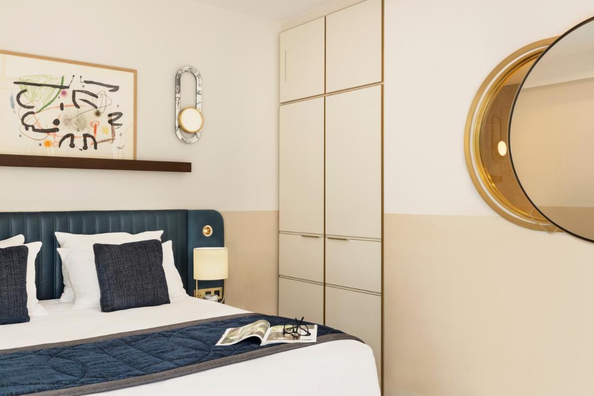 Un ou plusieurs lits dans un hébergement de l'établissement Maison Albar Hotels L’Imperator