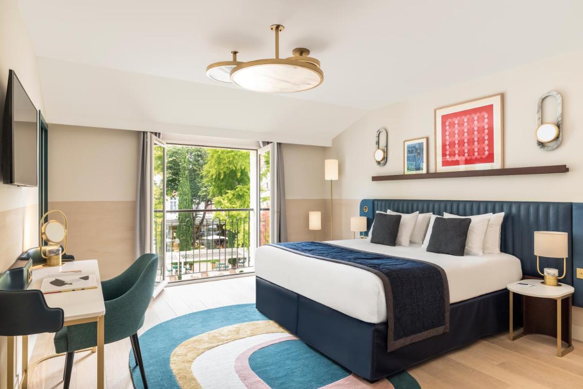 Un ou plusieurs lits dans un hébergement de l'établissement Maison Albar Hotels L’Imperator