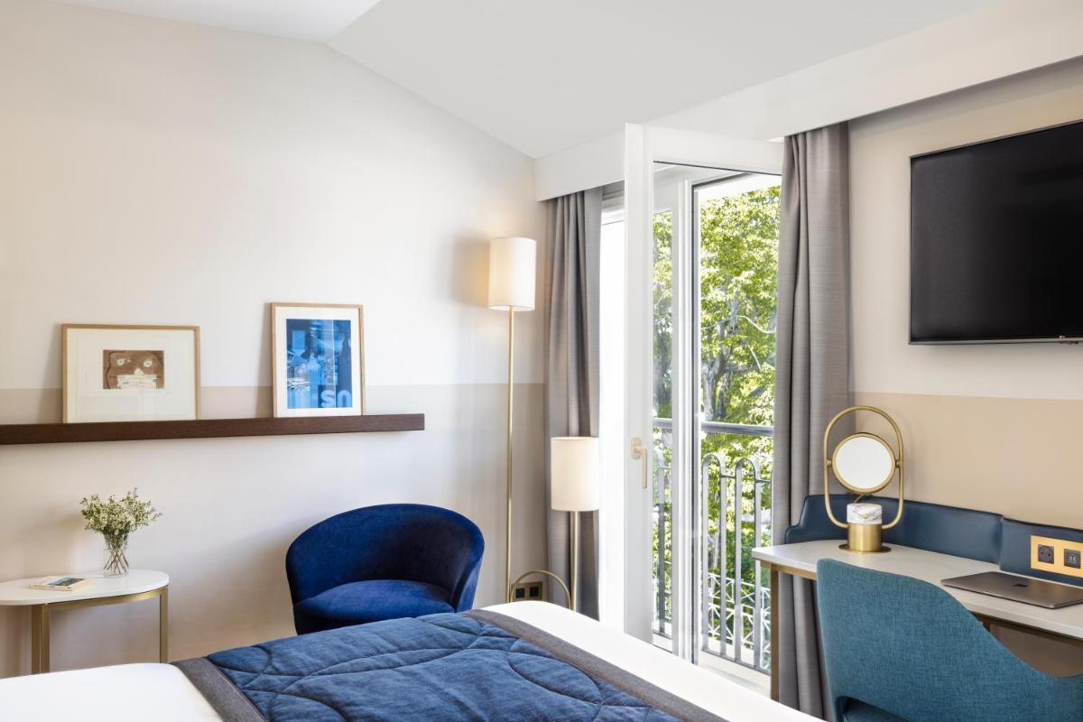 Un ou plusieurs lits dans un hébergement de l'établissement Maison Albar Hotels L’Imperator