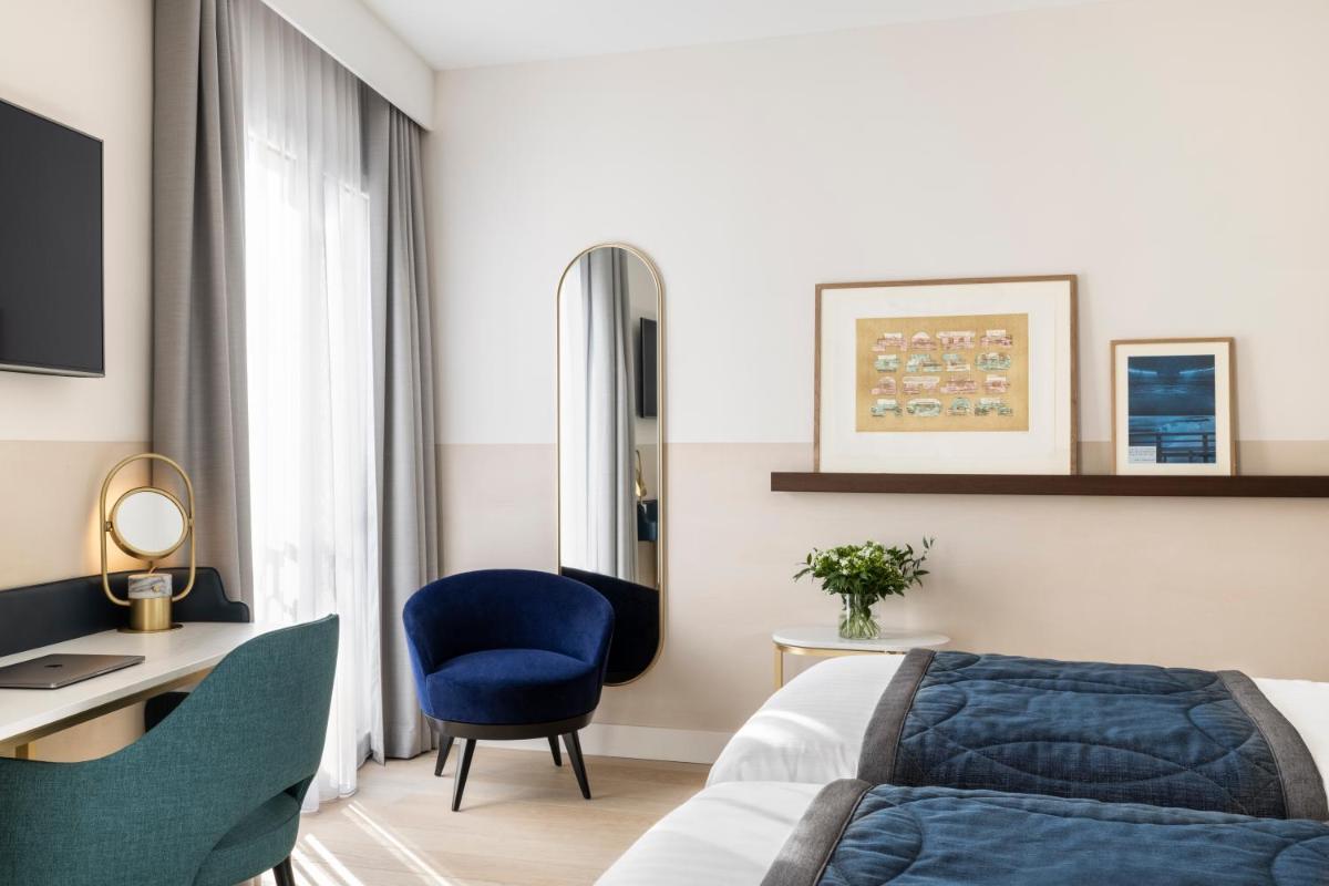 Un ou plusieurs lits dans un hébergement de l'établissement Maison Albar Hotels L’Imperator