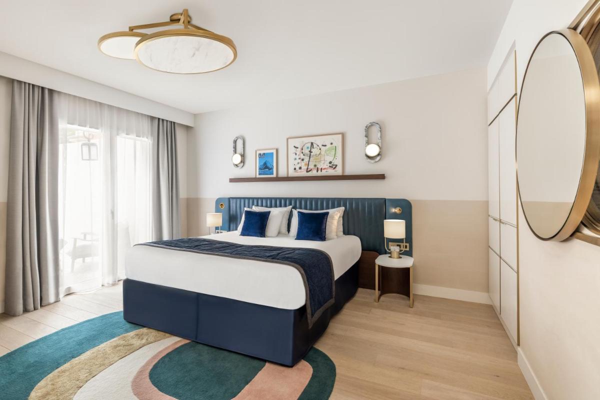 Un ou plusieurs lits dans un hébergement de l'établissement Maison Albar Hotels L’Imperator