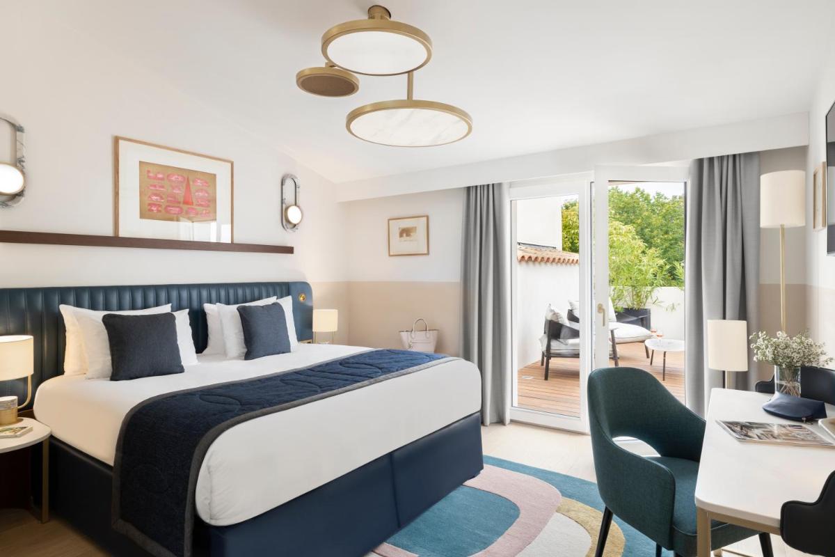 Un ou plusieurs lits dans un hébergement de l'établissement Maison Albar Hotels L’Imperator