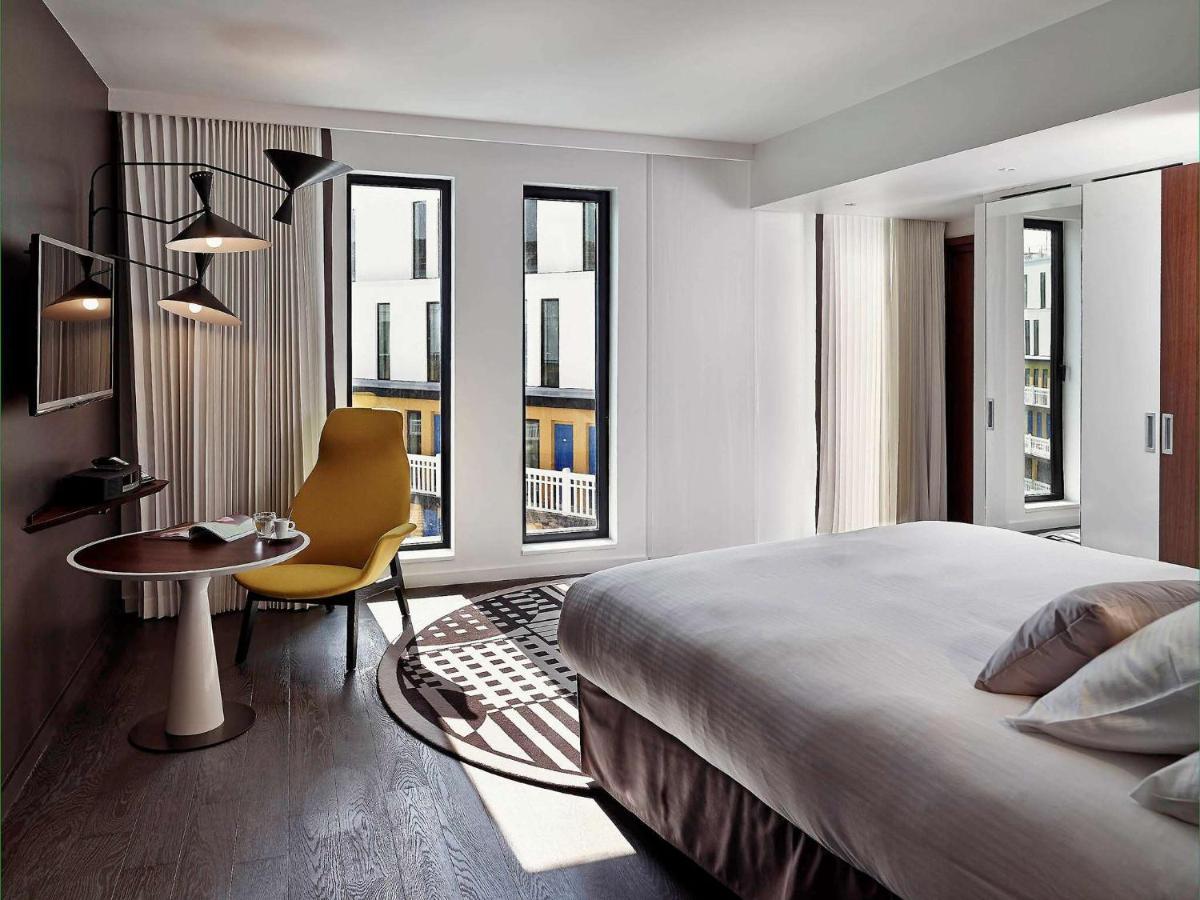 Un ou plusieurs lits dans un hébergement de l'établissement Molitor Hotel & Spa Paris - MGallery Collection