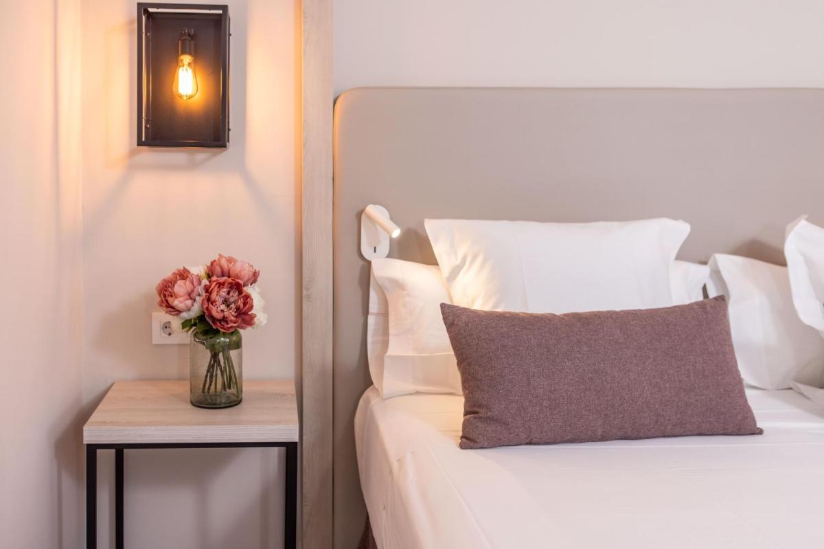 Cama o camas de una habitación en RVHotels Broquetas Spa Termal