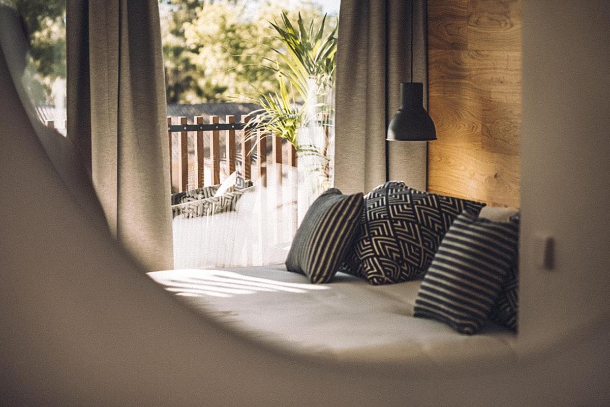 Cama o camas de una habitación en Las Gaviotas Suites Hotel & Spa