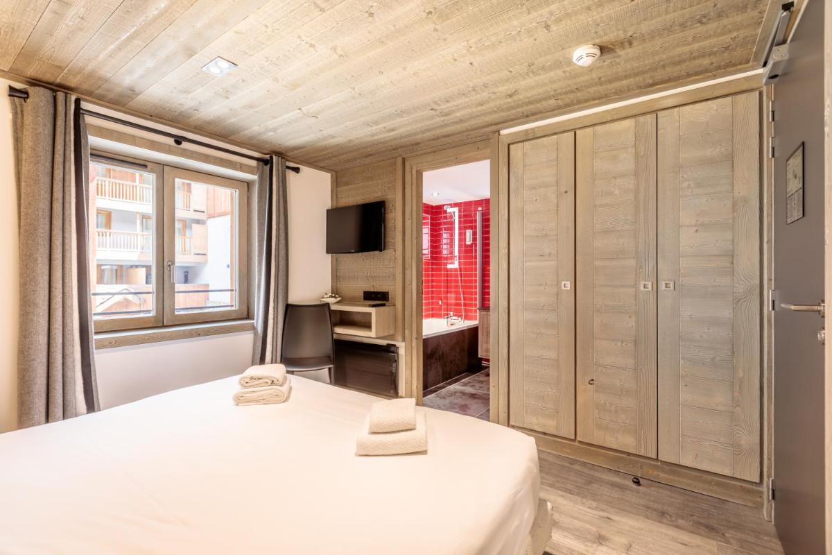 Un ou plusieurs lits dans un hébergement de l'établissement Victoria Lodge, Friendly Hotel