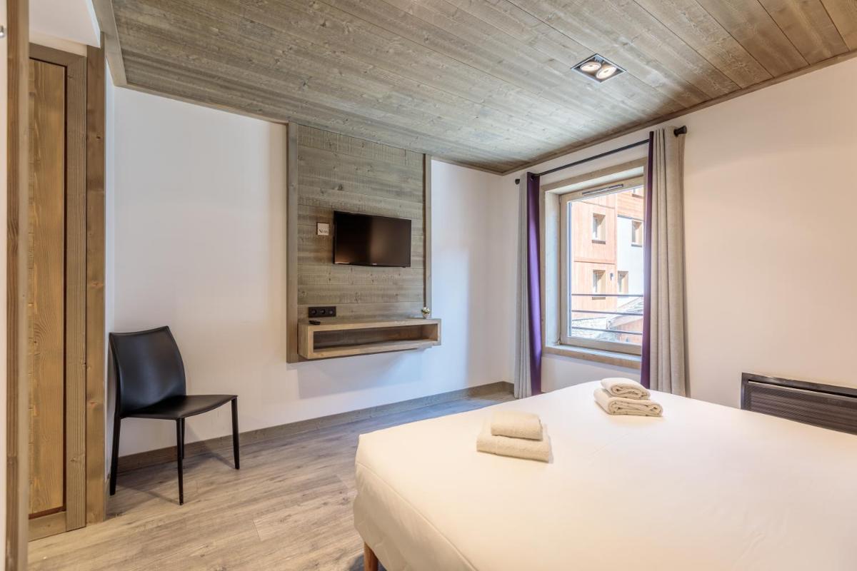 Un ou plusieurs lits dans un hébergement de l'établissement Victoria Lodge, Friendly Hotel