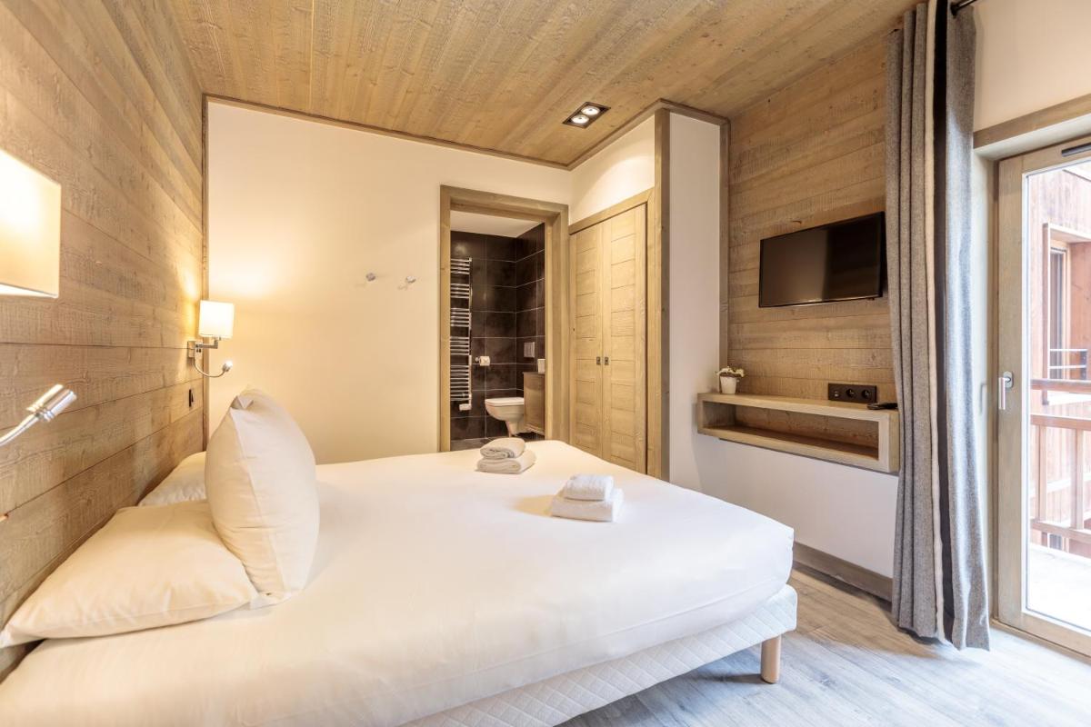 Un ou plusieurs lits dans un hébergement de l'établissement Victoria Lodge, Friendly Hotel