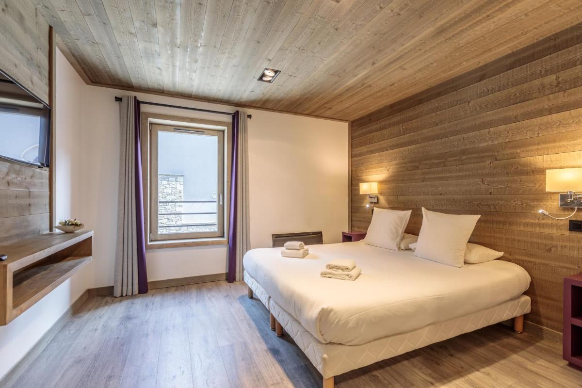 Un ou plusieurs lits dans un hébergement de l'établissement Victoria Lodge, Friendly Hotel