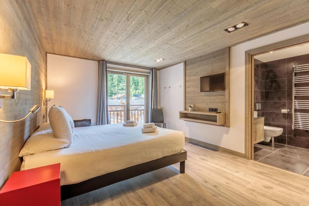 Un ou plusieurs lits dans un hébergement de l'établissement Victoria Lodge, Friendly Hotel