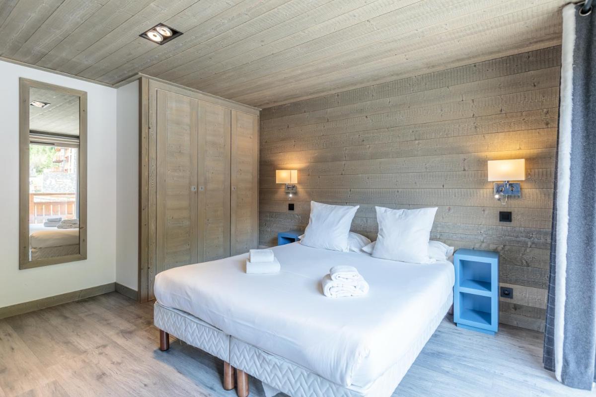Un ou plusieurs lits dans un hébergement de l'établissement Victoria Lodge, Friendly Hotel