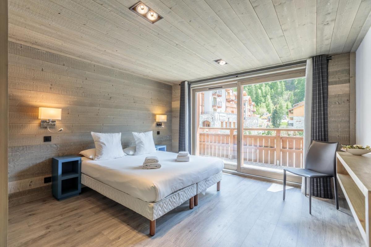 Un ou plusieurs lits dans un hébergement de l'établissement Victoria Lodge, Friendly Hotel