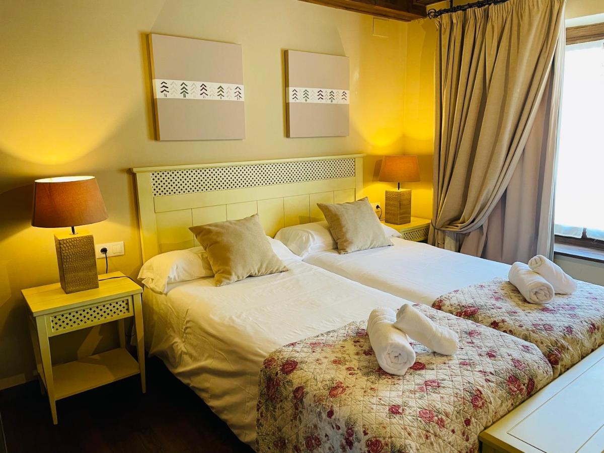 Cama o camas de una habitación en Tierras De Arán