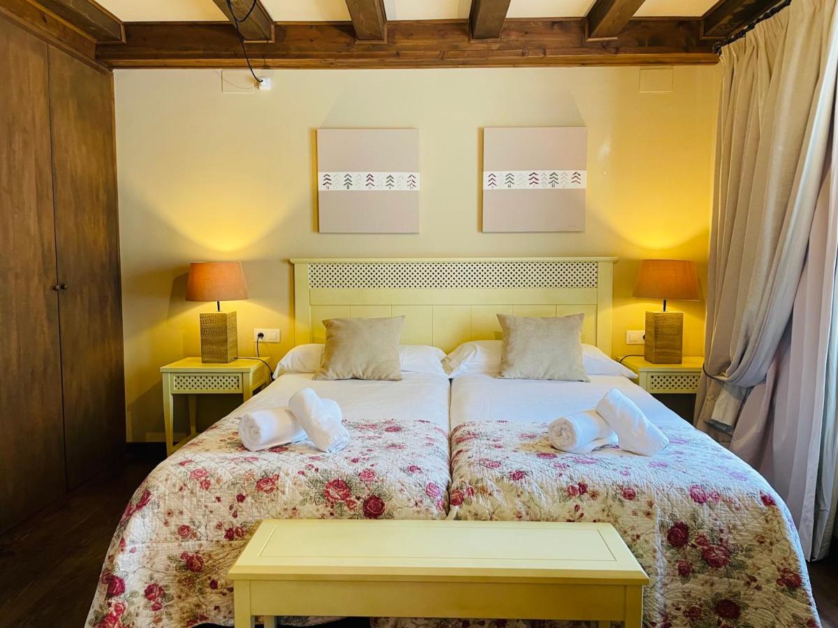 Cama o camas de una habitación en Tierras De Arán