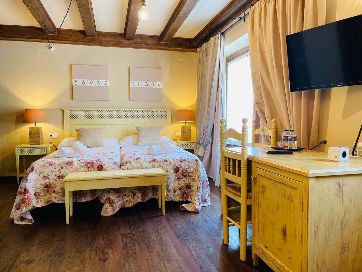 Cama o camas de una habitación en Tierras De Arán