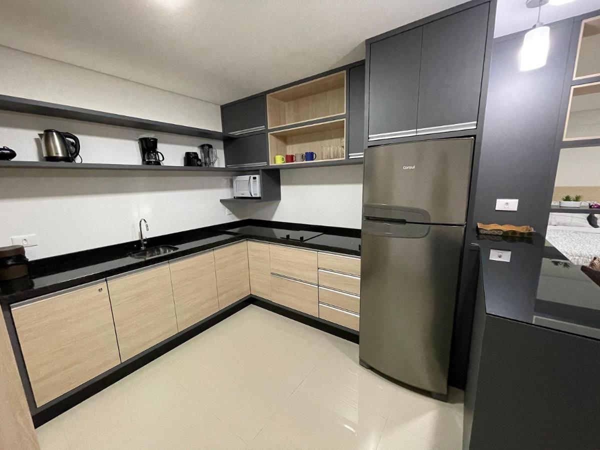 Novo Apt Studio no centro de FOZ com garagem - Housity