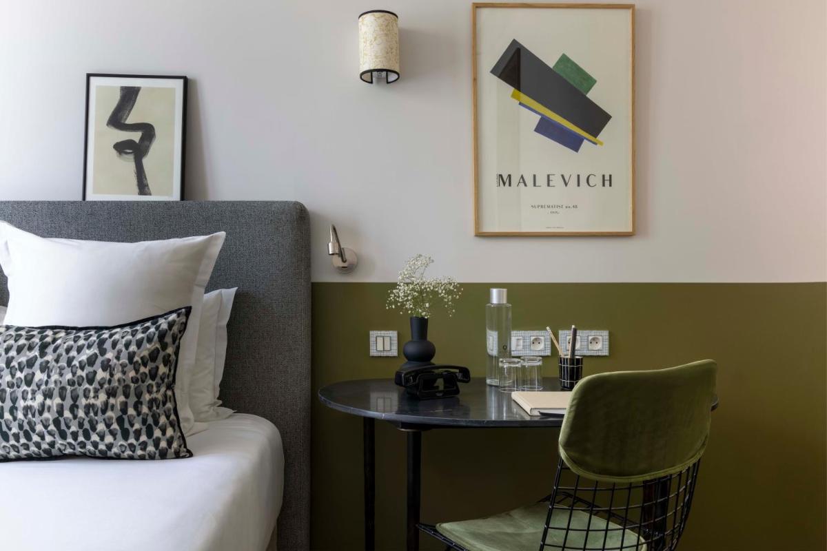 Coin salon dans l'établissement Le Petit Beaumarchais Hotel & Spa