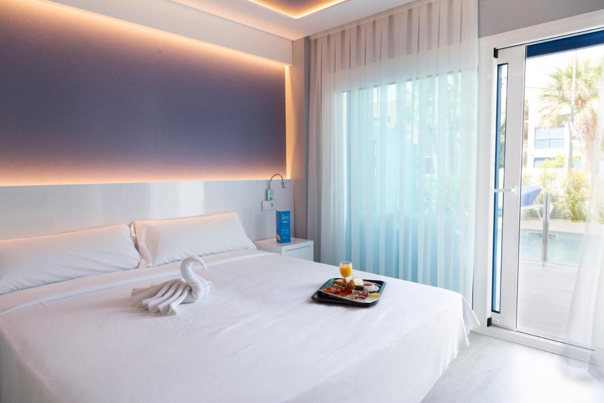 Cama o camas de una habitación en Masd Mediterraneo Hotel Apartamentos Spa