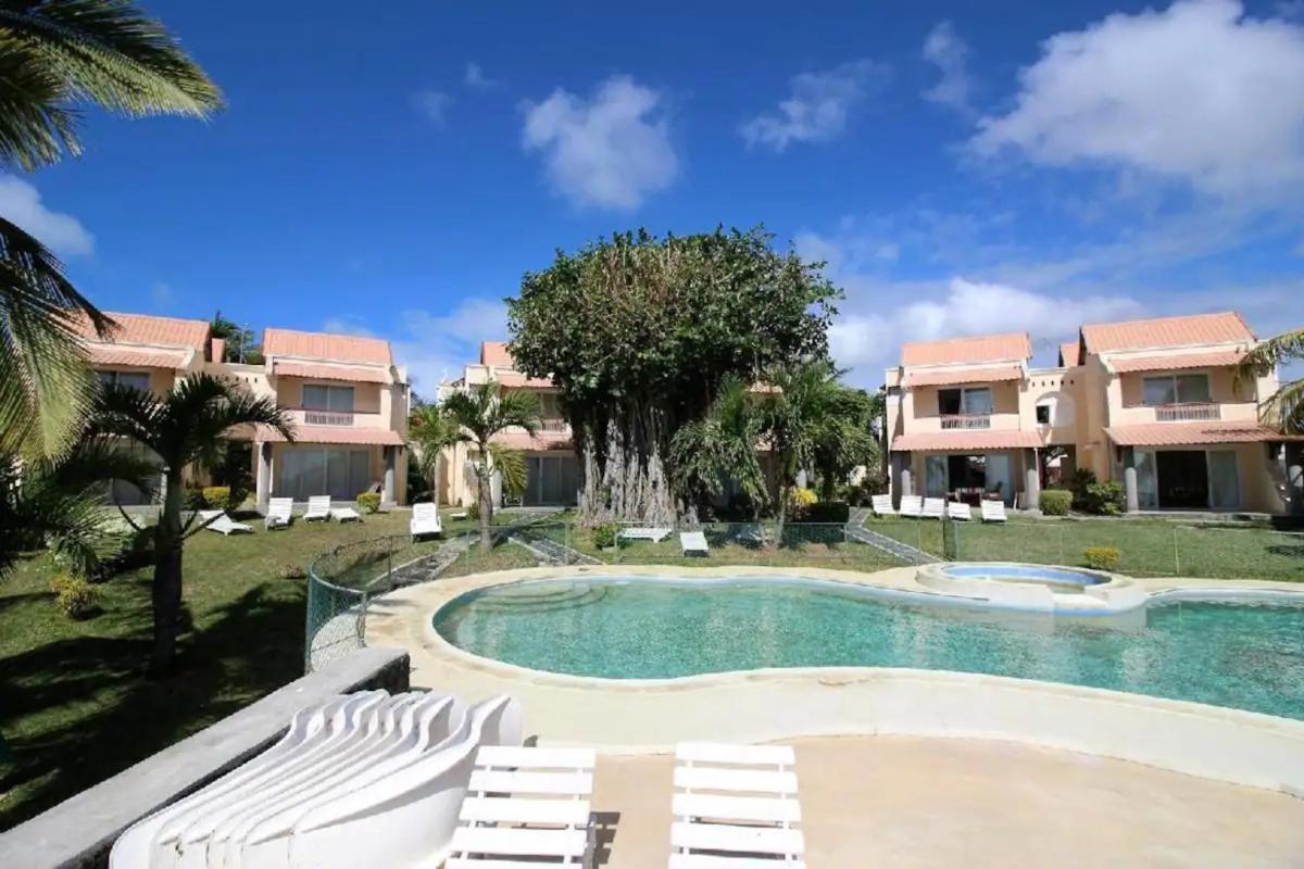3 bedrooms house with sea view shared pool and enclosed garden at Grand Gaube - Housity