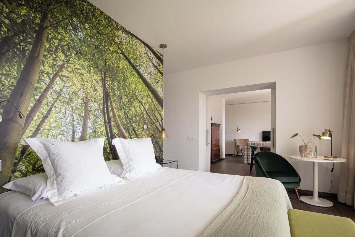 Uma cama ou camas num quarto em Senhora da Rosa, Tradition & Nature Hotel