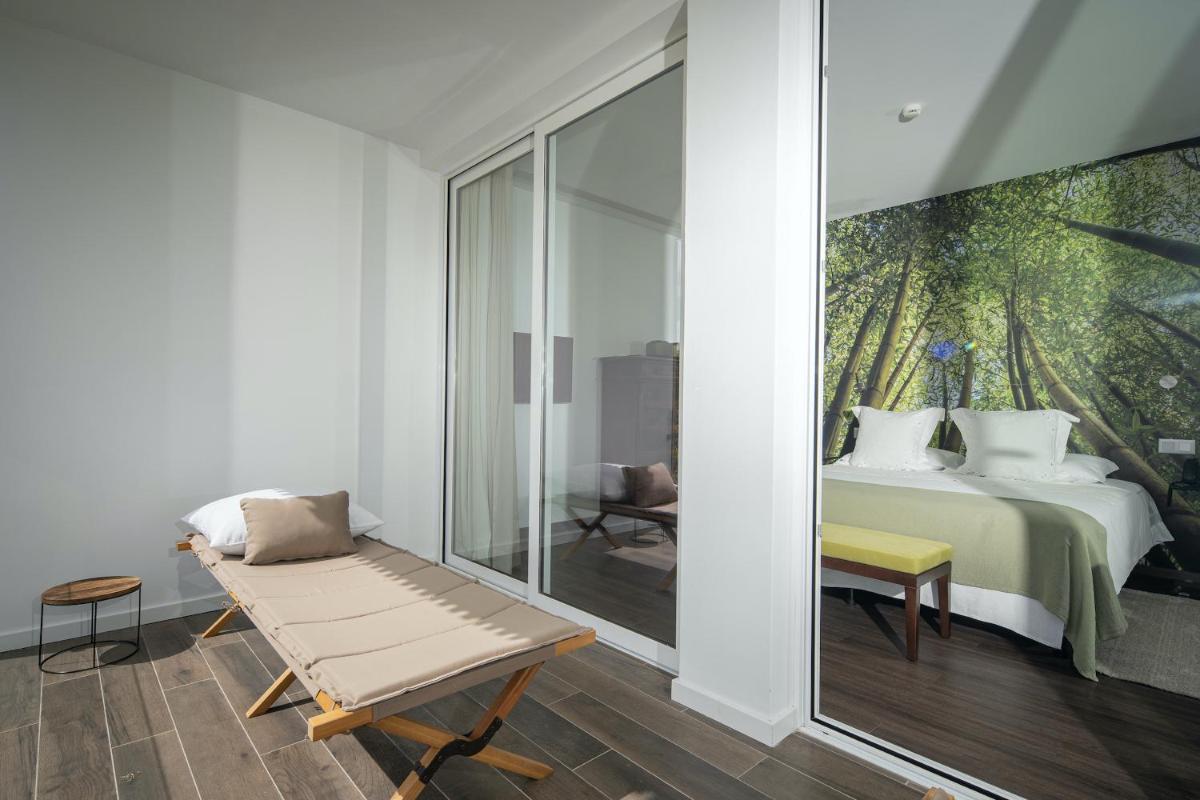 Uma cama ou camas num quarto em Senhora da Rosa, Tradition & Nature Hotel