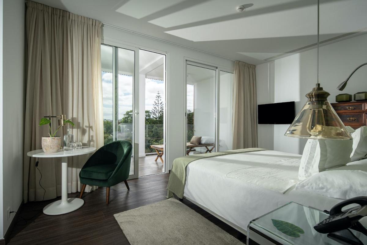 Uma cama ou camas num quarto em Senhora da Rosa, Tradition & Nature Hotel