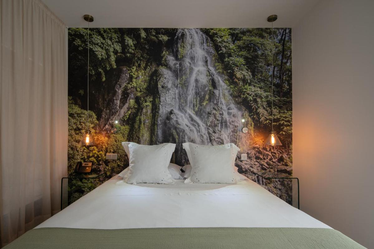 Uma cama ou camas num quarto em Senhora da Rosa, Tradition & Nature Hotel