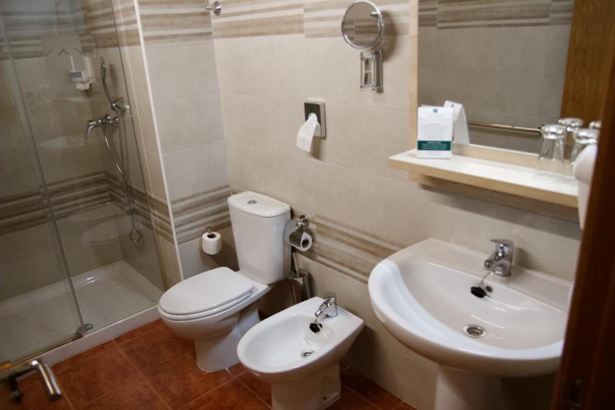 Un baño de Hotel Rural Las Montañas de Pumar