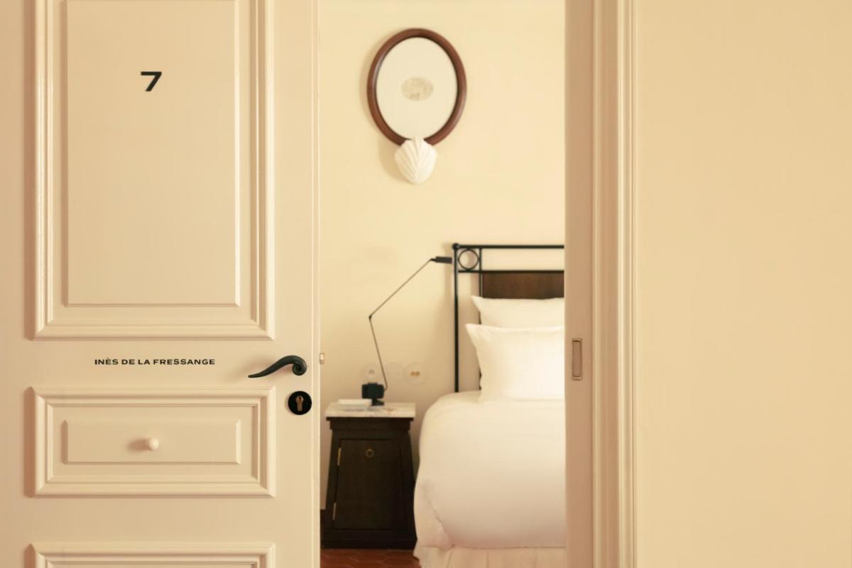 Un ou plusieurs lits dans un hébergement de l'établissement Hotel la Ponche