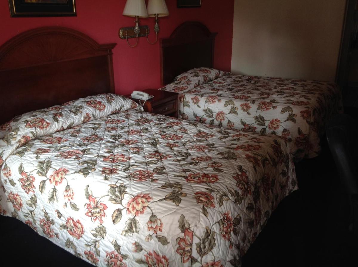 Executive Inn & Suites - Housity