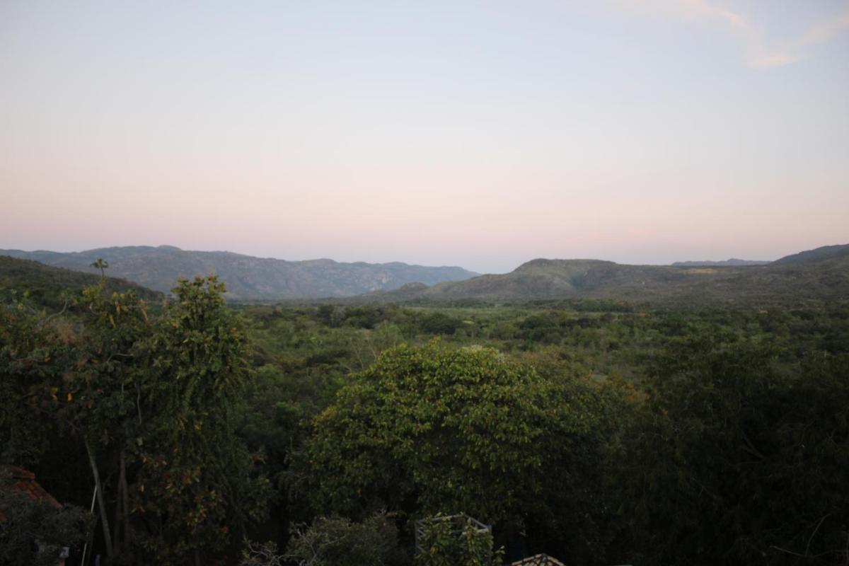Pousada Turquesa mirante com vista para as montanhas e por do sol - Housity
