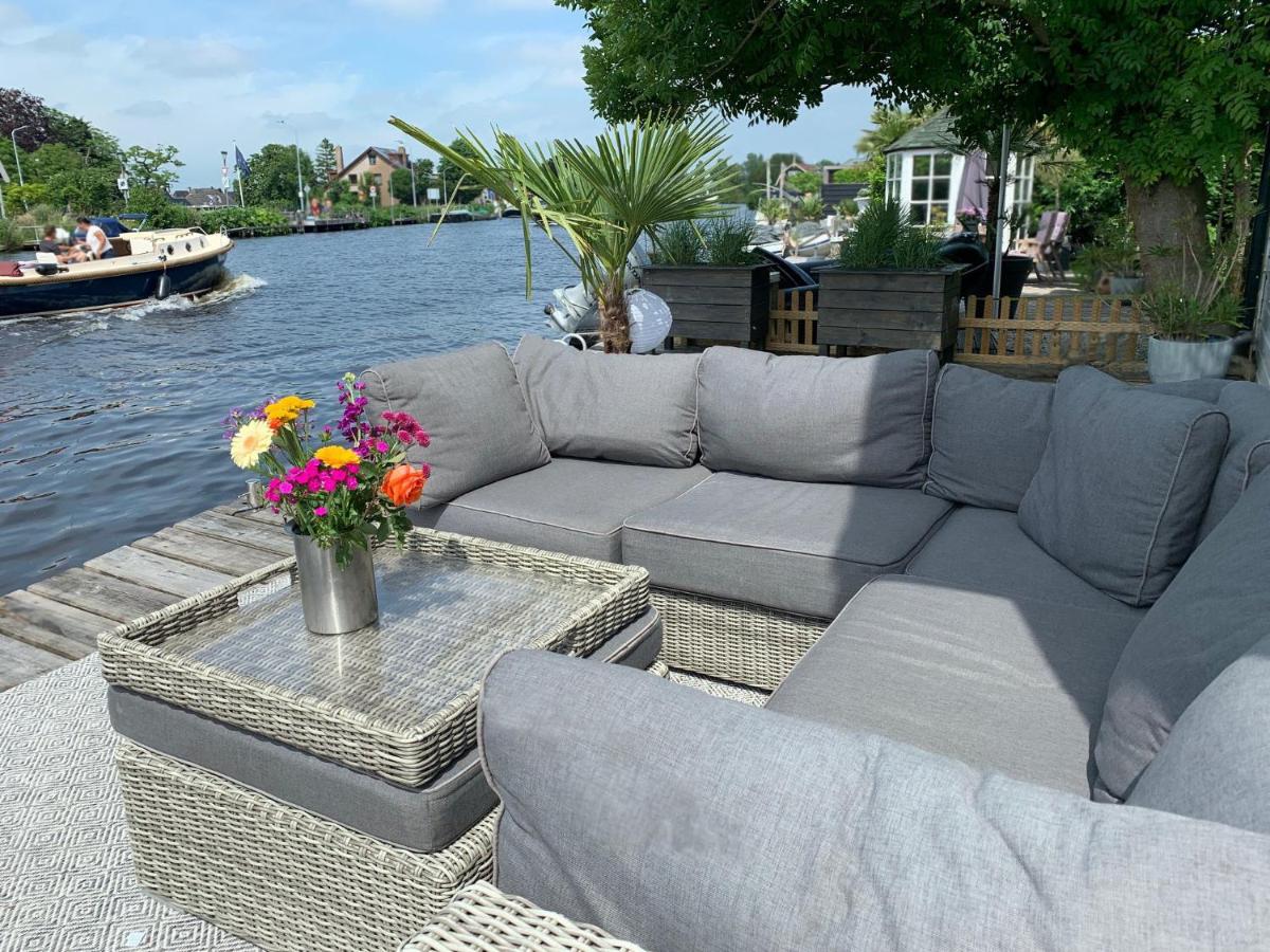 Holiday home at the water, fire place, boat and SUP rent, near Amsterdam - Housity