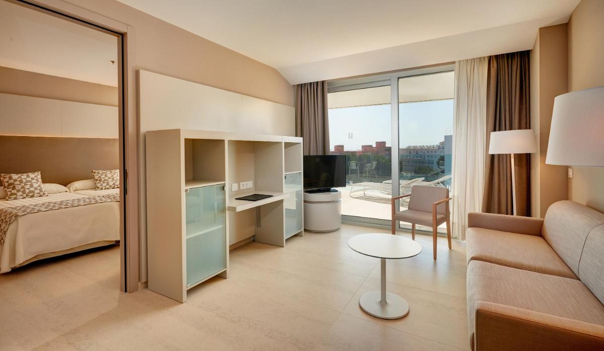 Cama o camas de una habitación en Hipotels Gran Playa de Palma