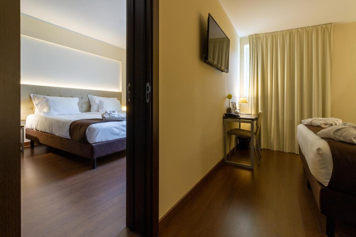 Uma cama ou camas num quarto em In Gold Hotel & Spa