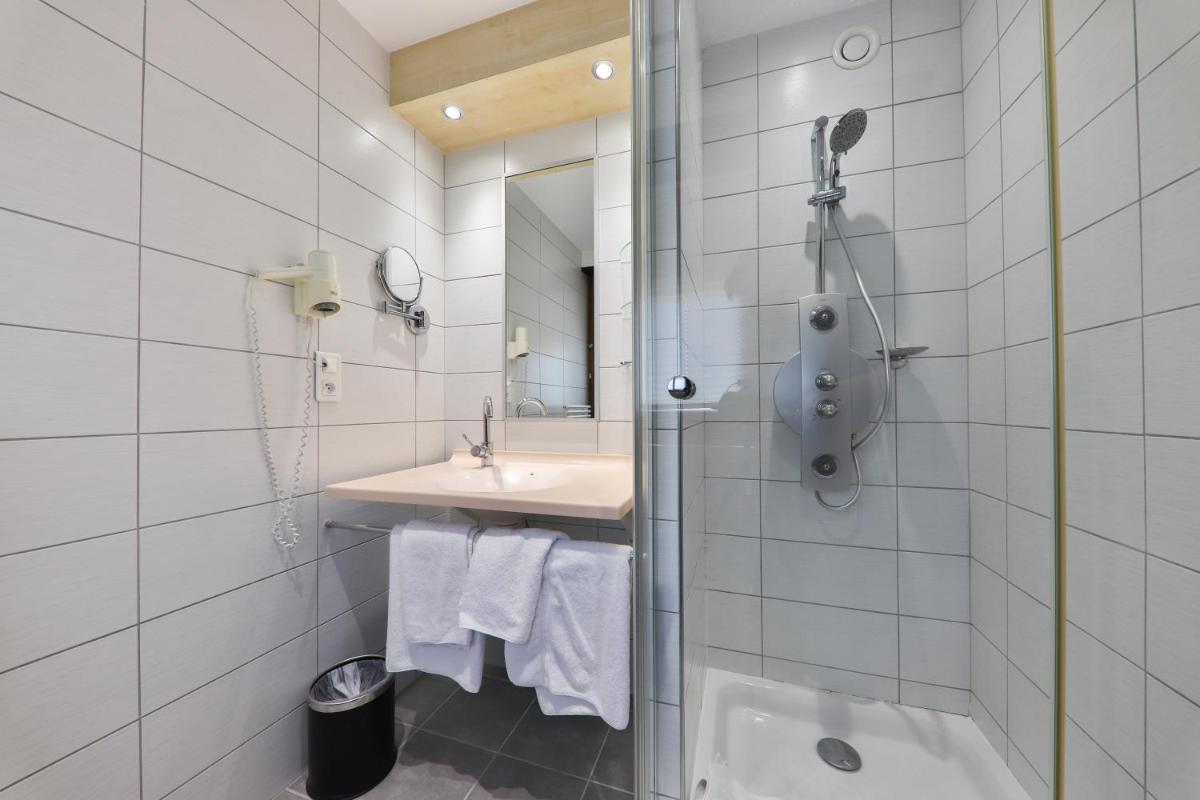 Salle de bains dans l'établissement Hôtel Restaurant et Spa Au Tilleul