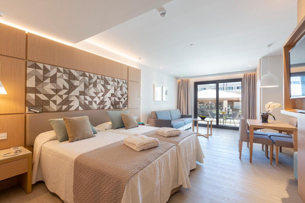 Cama o camas de una habitación en Hipotels Barrosa Park