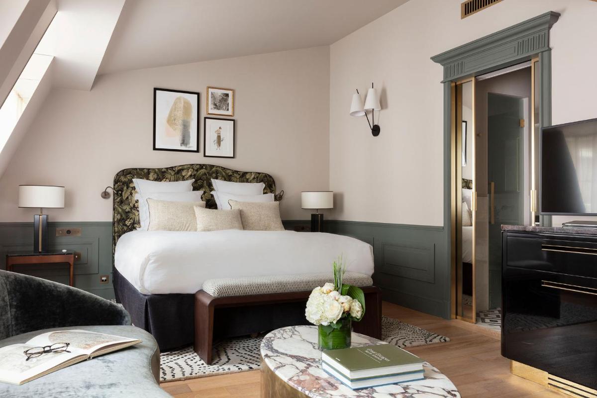 Un ou plusieurs lits dans un hébergement de l'établissement Les Jardins du Faubourg Hotel & Spa by Shiseido
