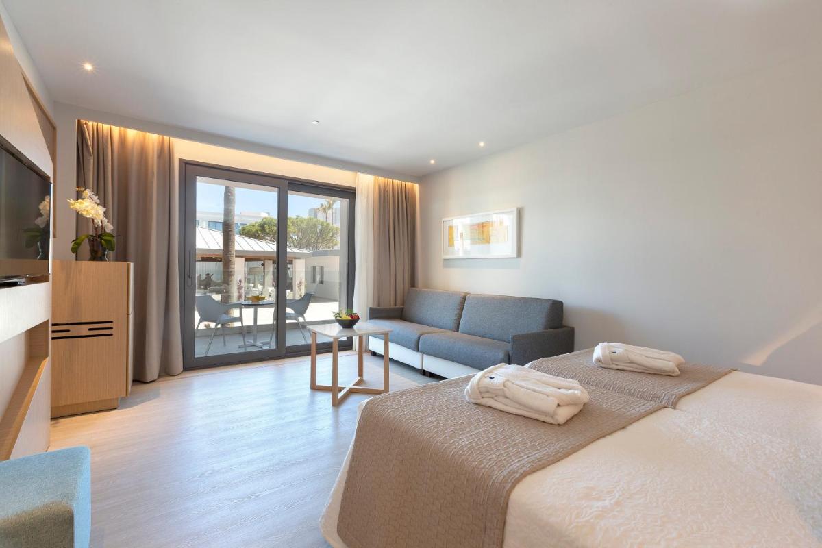 Cama o camas de una habitación en Hipotels Barrosa Park