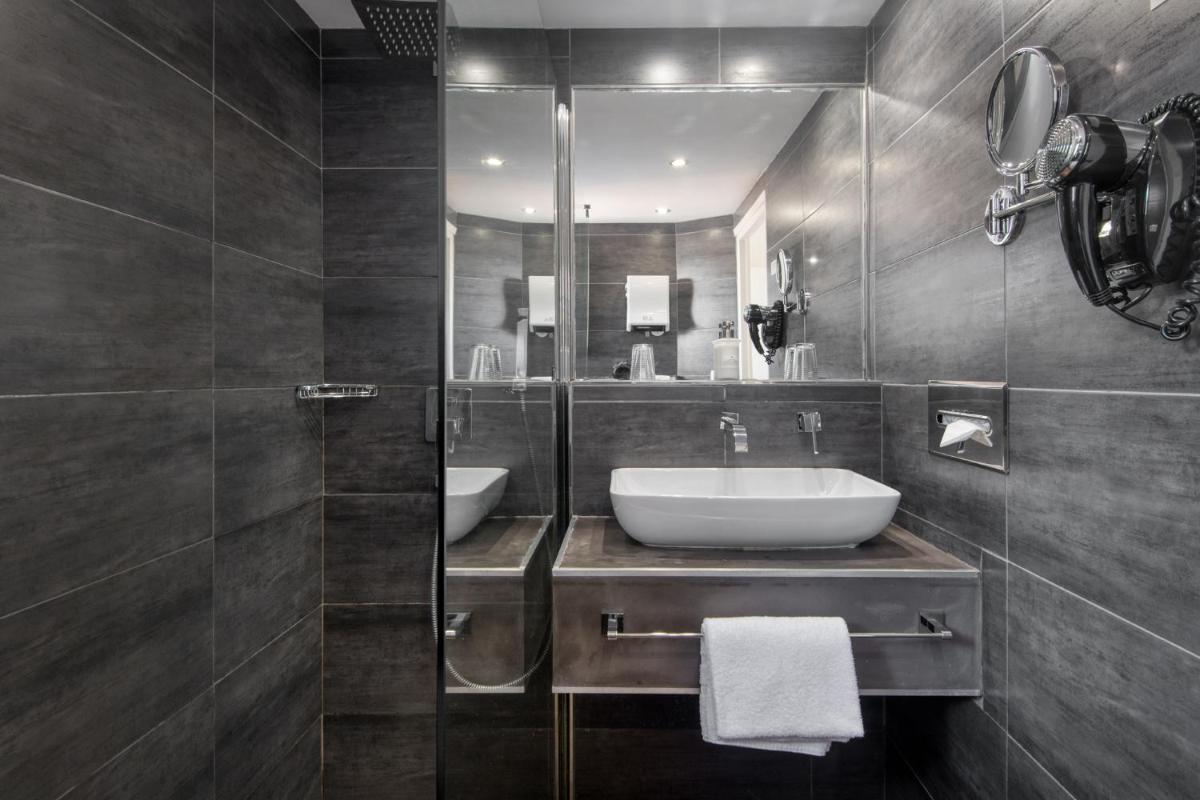 Salle de bains dans l'établissement Hôtel Restaurant & Spa Plaisir