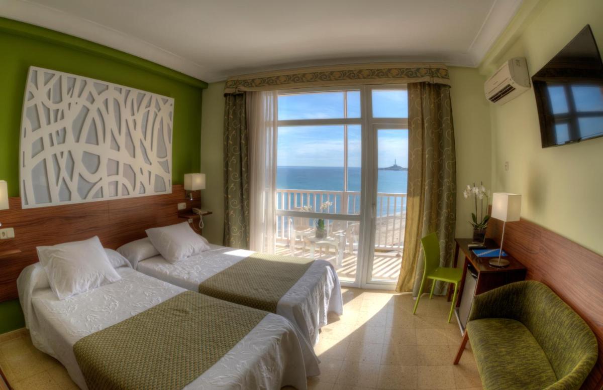 Cama o camas de una habitación en Hotel & Spa Entremares